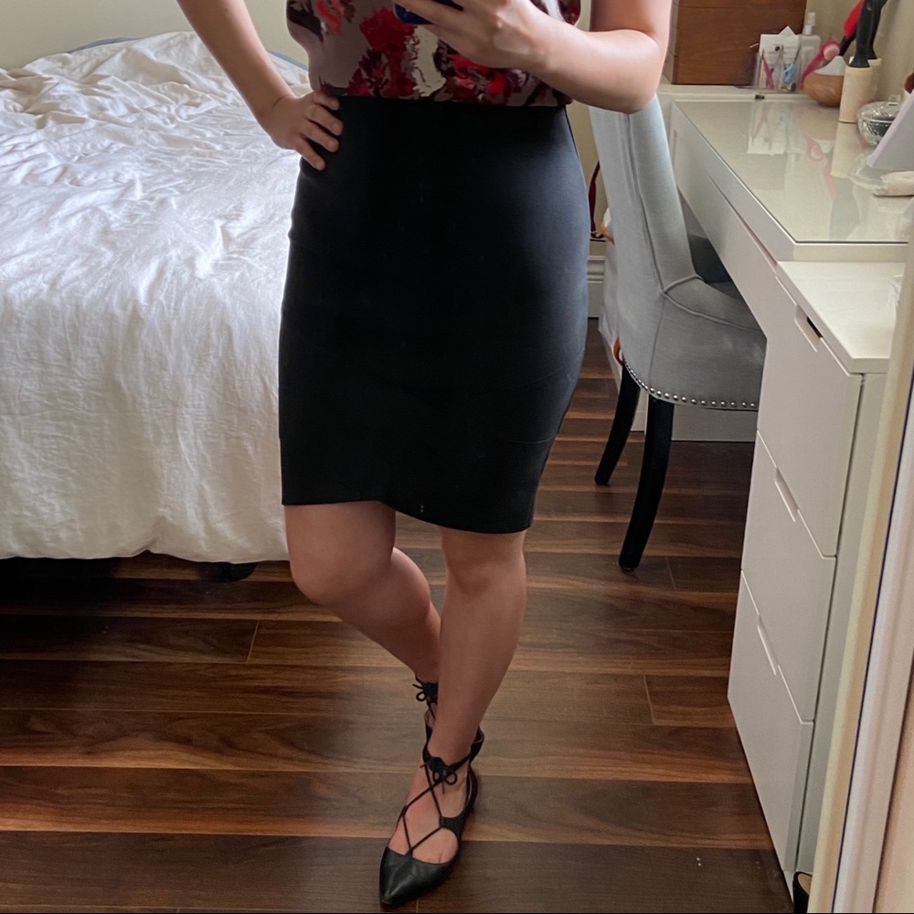 Black bodycon bandage skirt with tulip hem